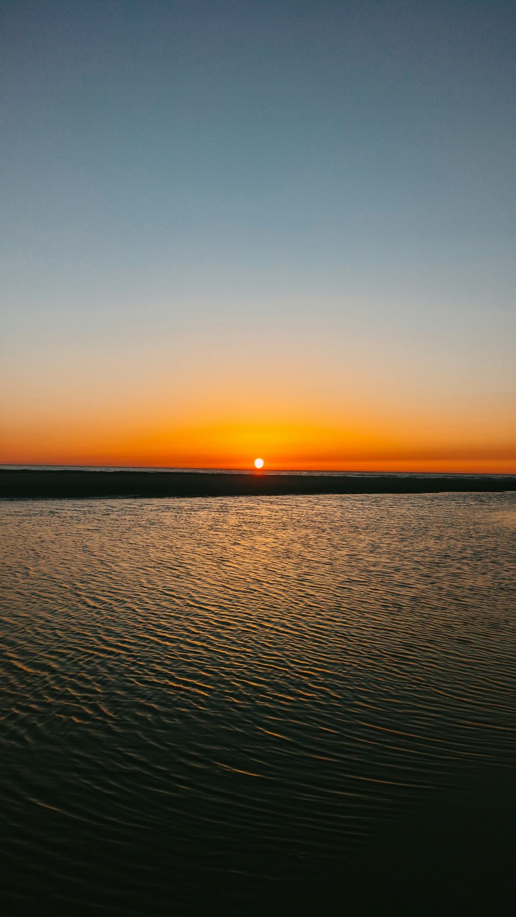 Coucher de soleil sur les sables de la baie